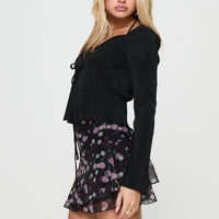 Sunny Skies Mini Skirt Black Floral
