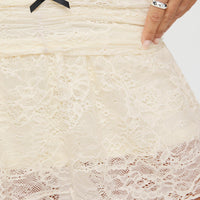 Feel The Heat Lace Mini Skirt Cream