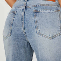 Holly Mid Rise Straight Leg Asymmetric Jean Light Wash Denim