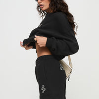 Princess Polly Track Shorts Cursive Text Black Sand