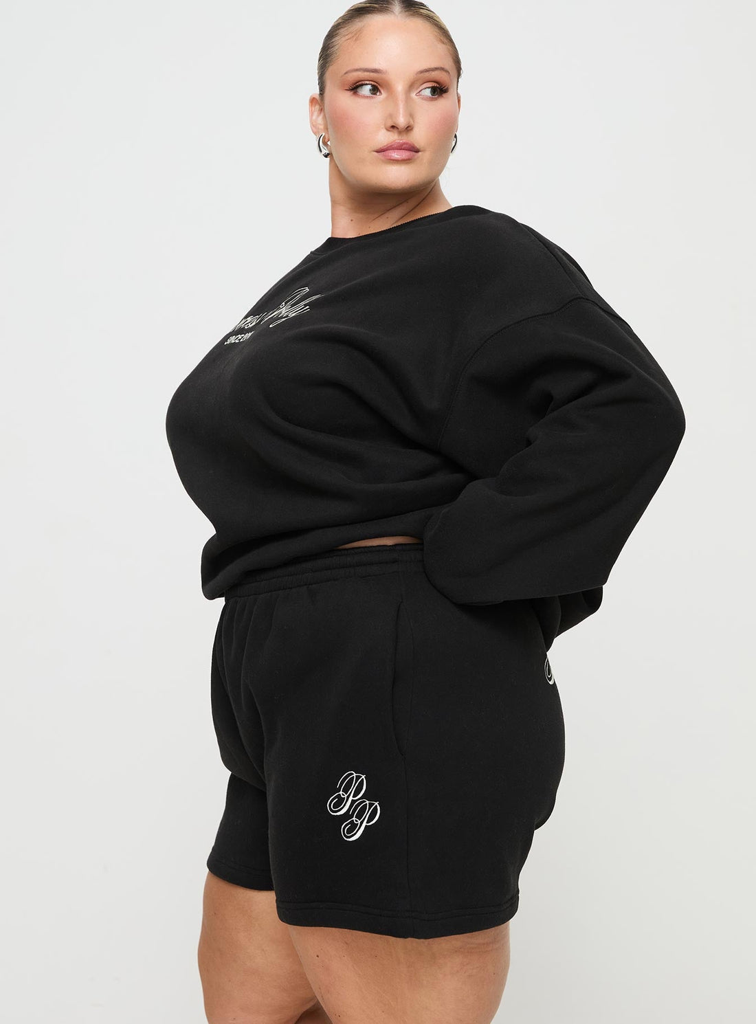 Princess Polly Track Shorts Cursive Text Black Sand Curve